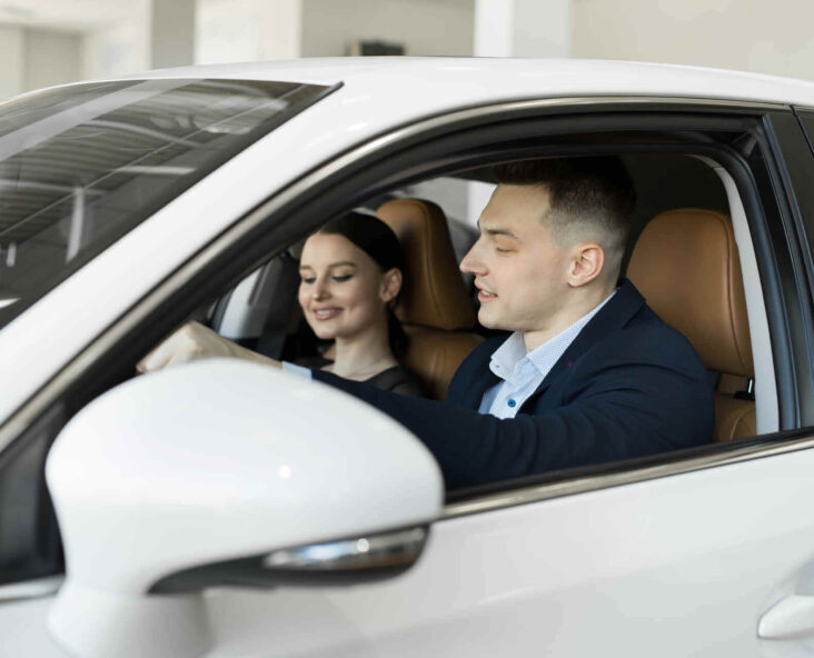 Couple taking a luxury vehicle on a test drive in Colorado