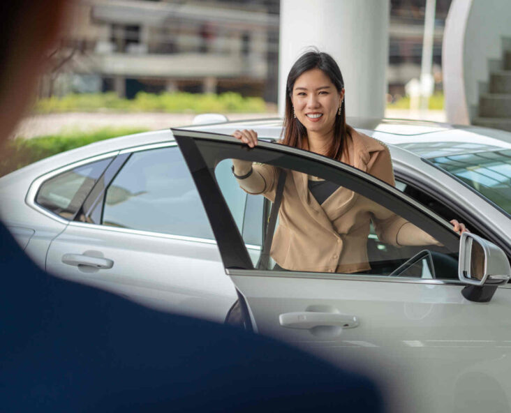 Woman with professional car consignment for endless garage in loveland, co